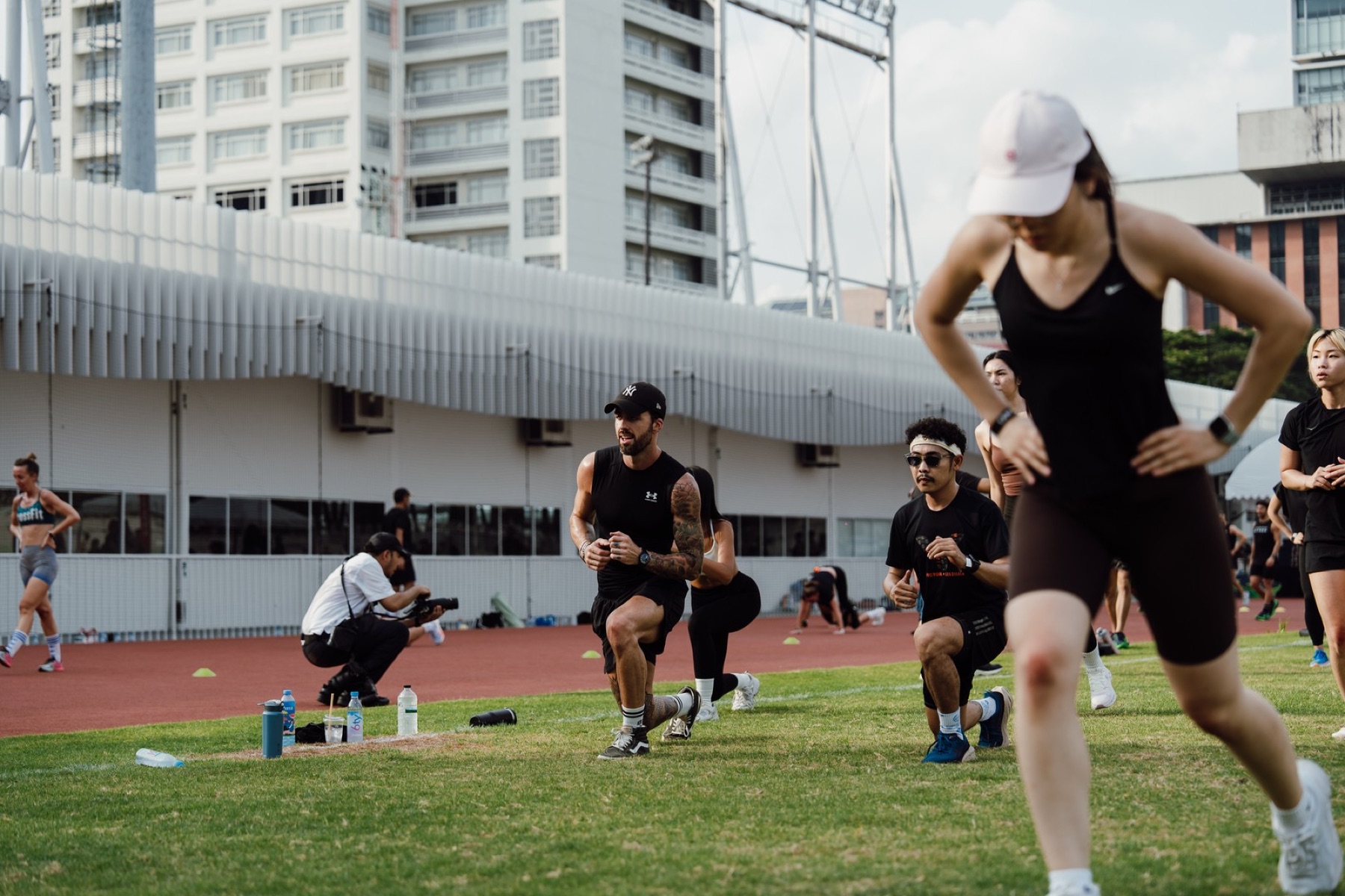 Group training session on an outdoor track